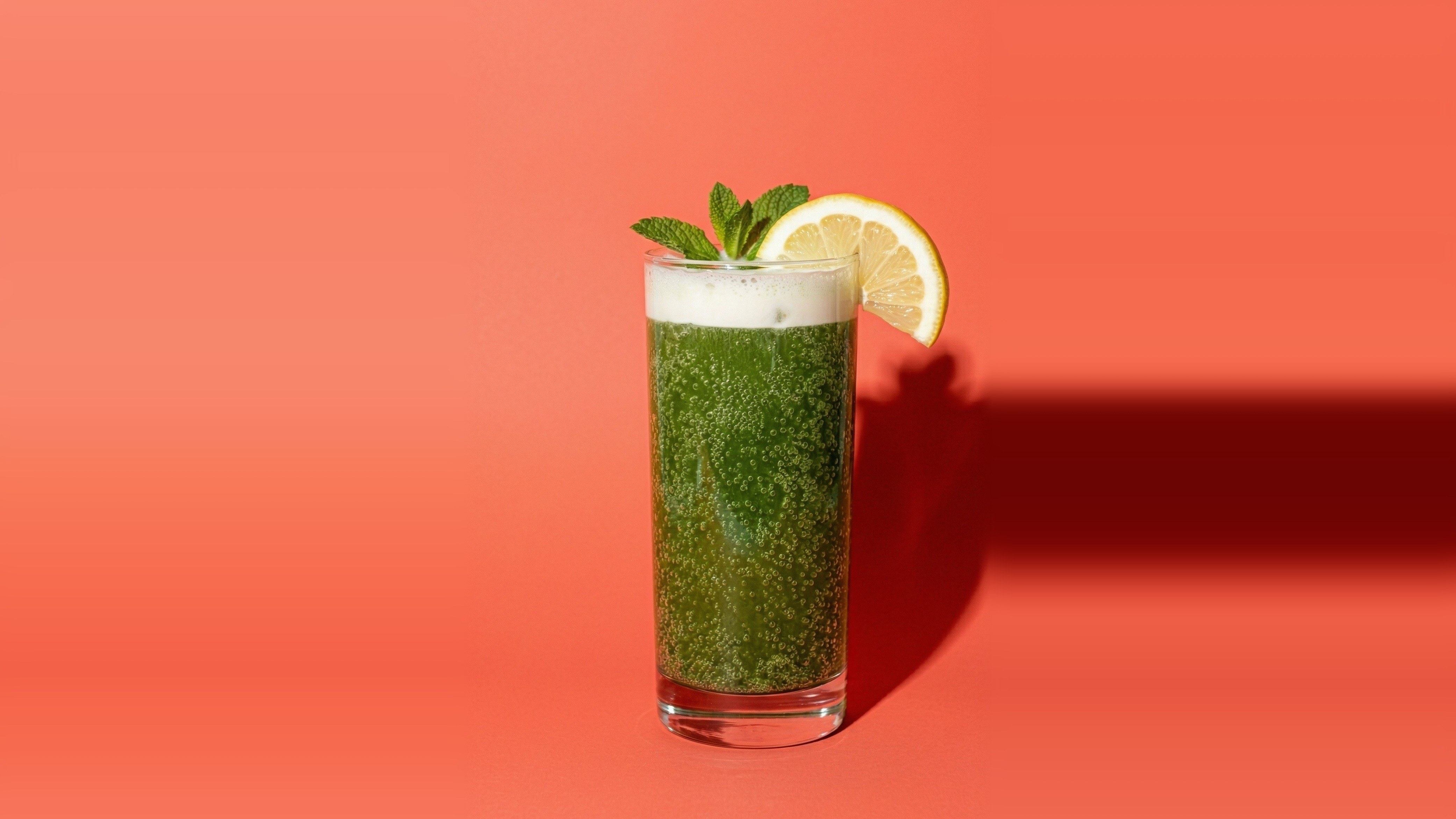 Sparkling Matcha — fizzy green matcha with sparkling water, oat milk float, mint, and lemon