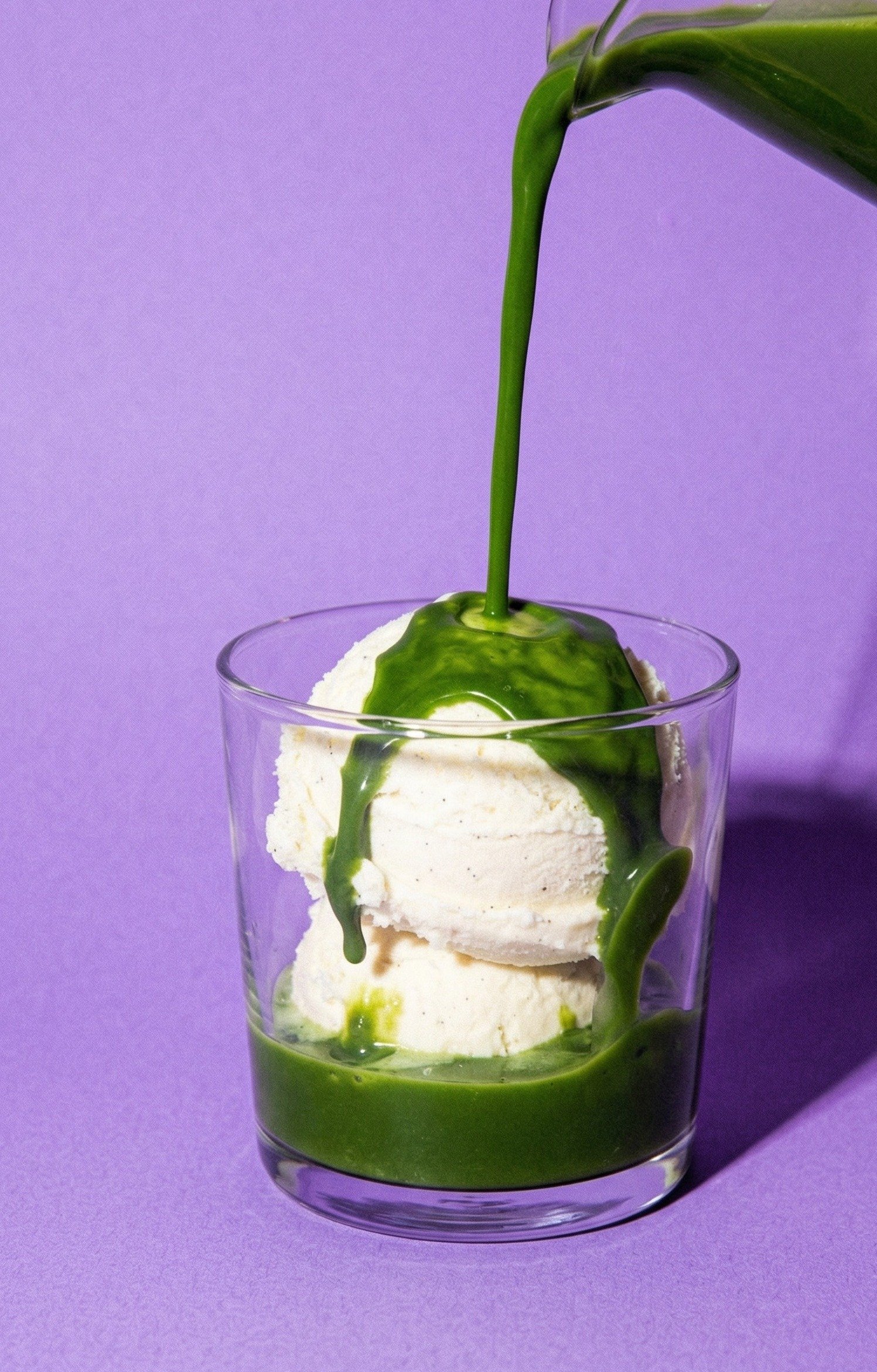 Matcha Affogato — vibrant green matcha poured over a scoop of vanilla ice cream in a rocks glass