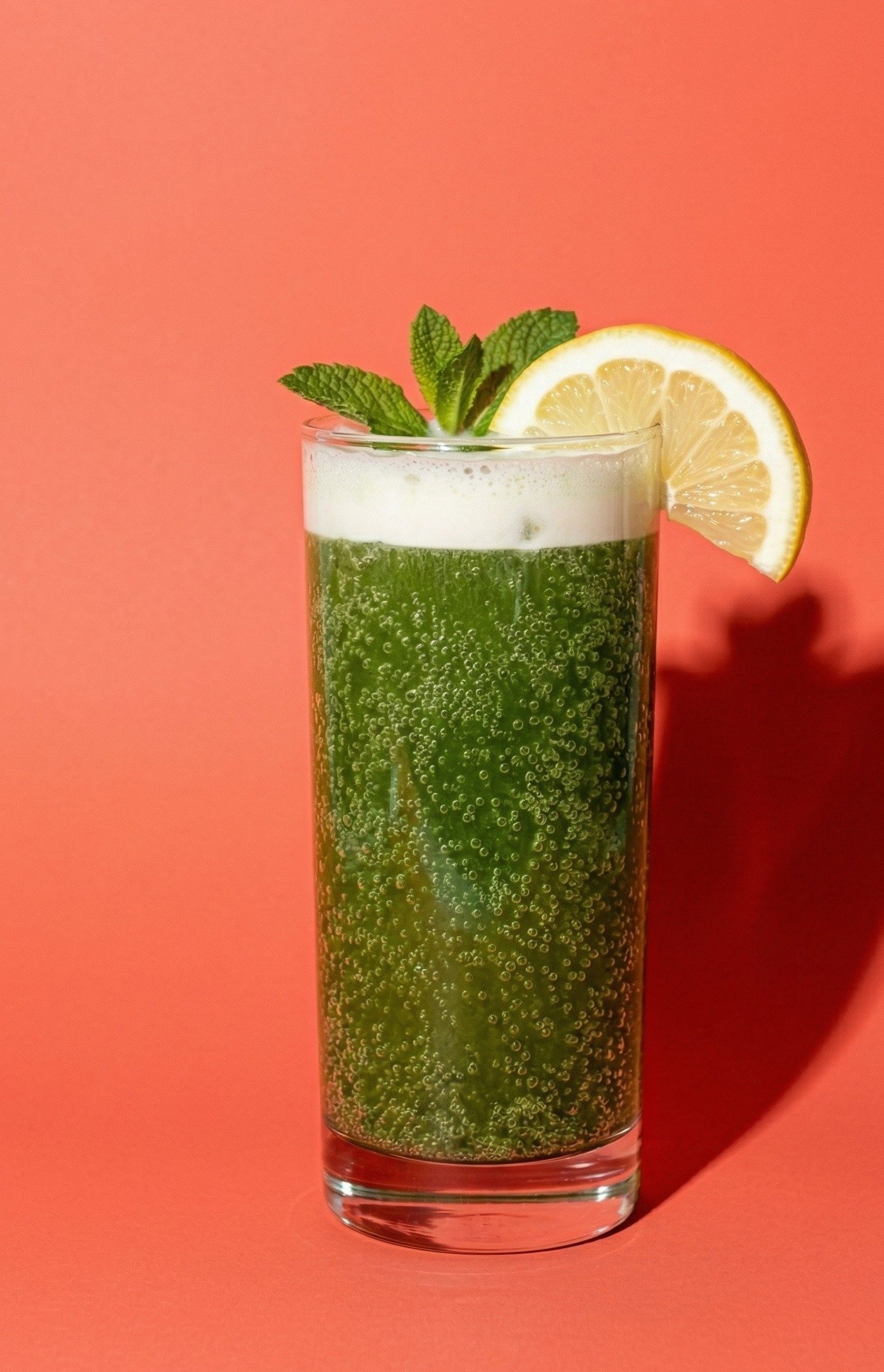 Sparkling Matcha — fizzy green matcha with sparkling water, oat milk float, mint, and lemon